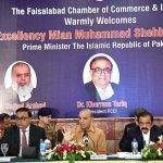 Prime Minister Muhammad Shehbaz Sharif addresses the members of the Faisalabad Chamber of Commerce and Industries