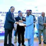 Prime Minister Muhammad Shehbaz Sharif distributes cheques among the fishermen of Gwadar