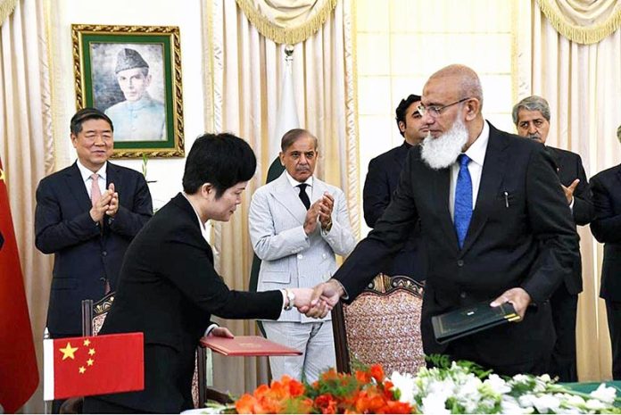 Prime Minister Muhammad Shehbaz Sharif and Vice -Premier of State Council of China He Lifeng witnessing the signing ceremony of agreements/MoUs signed between the two countries in various fields
