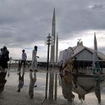 People visiting Shah Faisal Masjid in a pleasant weather after heavy rain that experienced at morning time in the city