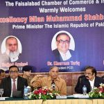 Prime Minister Muhammad Shehbaz Sharif addresses the members of the Faisalabad Chamber of Commerce and Industries