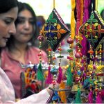 Visitors looking at handmade stuff during Dastkaar Mela organized by Punjab Small Industries in cooperation with Government of the Punjab “Pakistan Handicraft Shops Promoting Artisans and Handicrafts