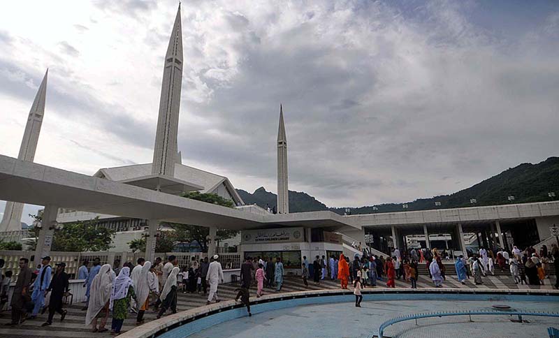 People visiting Shah Faisal Masjid in a pleasant weather after heavy rain that experienced at morning time in the city