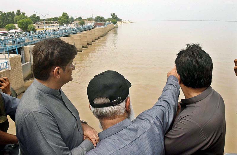 Chief Minister Syed Murad Ali Shah during his visit to Guddu Barrage being briefed about the current flood situation by Minister Irrigation Jam Khan Shoro and Secretary Irrigation Zarif Khero