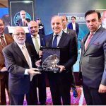 Prime Minister Muhammad Shehbaz Sharif presenting lifetime achievement award to Sardar M. Yasin Malik during Pharma Export Summit & Awards ceremony