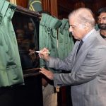Prime Minister Muhammad Shehbaz Sharif signing the plaque of the groundbreaking of the Smart Special Economic Zone Sheikhupura