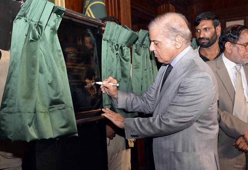 Prime Minister Muhammad Shehbaz Sharif signing the plaque of the groundbreaking of the Smart Special Economic Zone Sheikhupura