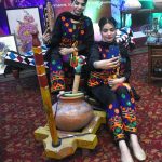 Visitors taking selfie with handicrafts at Dastkaar Mela organized by Punjab Small Industries in cooperation with Government of the Punjab “Pakistan Handicraft Shops Promoting Artisans and Handicrafts