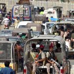 Paramilitary troops patrol at Numaish Chowrangi as part of security steps ahead of Muharram processions