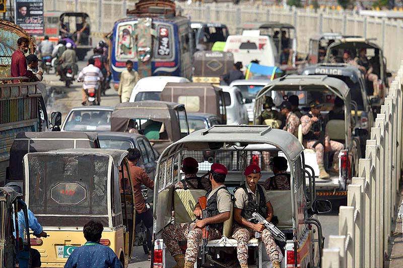 Paramilitary troops patrol at Numaish Chowrangi as part of security steps ahead of Muharram processions