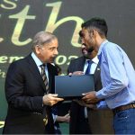 Prime Minister Muhammad Shehbaz Sharif distributes laptops among the high achievers of public sector universities of Sindh under PM's Youth Laptop Scheme 2023 at Governor House