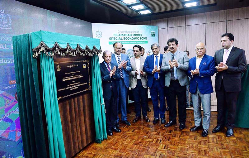 Prime Minister Muhammad Shehbaz Sharif unveiling a plaque to mark the groundbreaking of Islamabad Model Special Economic Zone