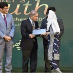 Prime Minister Muhammad Shehbaz Sharif distributes laptops among the high achievers of public sector universities of Sindh under PM's Youth Laptop Scheme 2023 at Governor House