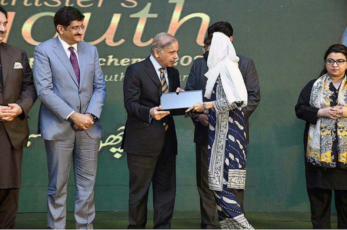 Prime Minister Muhammad Shehbaz Sharif distributes laptops among the high achievers of public sector universities of Sindh under PM's Youth Laptop Scheme 2023 at Governor House Prime Minister Muhammad Shehbaz Sharif distributes laptops among the high achievers of public sector universities of Sindh under PM's Youth Laptop Scheme 2023 at Governor House