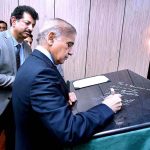 Prime Minister Muhammad Shehbaz Sharif signs a commemorative board during the groundbreaking ceremony of Islamabad Model Special Economic Zone