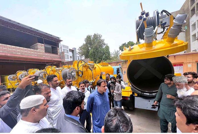 Mayor Karachi Murtaza Wahab inspects the machineries and vehicles during his visit to Mairaj Limited factory