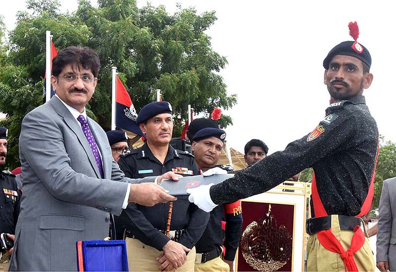 Sindh Chief Minister Syed Murad Ali Shah distributes certificates among the position holders at the 117th passing out parade at Shahid Hayat Police Training College, Saeedabad