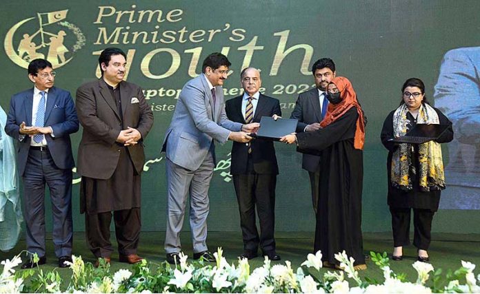 Sindh Chief Minister Murad Ali Shah distributes laptops among the high achievers of public sector universities of Sindh under PM's Youth Laptop Scheme 2023 Sindh Chief Minister Murad Ali Shah distributes laptops among the high achievers of public sector universities of Sindh under PM's Youth Laptop Scheme 2023