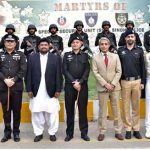 Sindh Governor Kamran Khan Tessori in a group photo with DIG Maqsood Meson and other Police personnel during his visit of Special Security Units