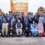 President Dr. Arif Alvi in a group photo with the participants of the 37th Mid-Career Management Course, Quetta, at Aiwan-e-Sadr