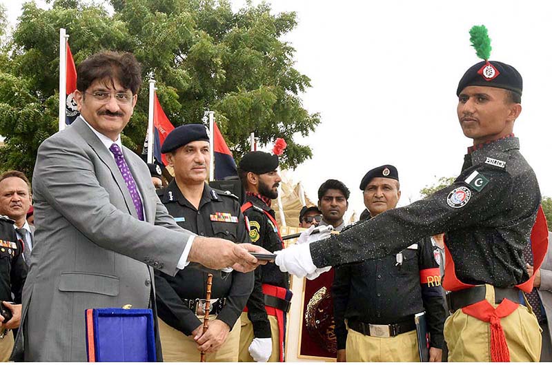 Sindh Chief Minister Syed Murad Ali Shah distributes certificates among the position holders at the 117th passing out parade at Shahid Hayat Police Training College, Saeedabad