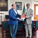 Federal Insurance Ombudsman (FIO) Dr. Muhammad Khawar Jameel is presenting the Annual Report 2022 of FIO to Minister for Law and Justice Senator Azam Nazir Tarar