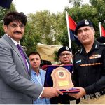 Karachi Inspector General Police Ghulam Nabi Memon presents a memento to Sindh Chief Minister Syed Murad Ali Shah at the 117th Passing Out Parade at Shahid Hayat Police Training College, Saeedabad
