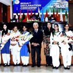 Minister for Federal Education and Professional Training, Rana Tanveer Hussain in a group photograph with the top position holders in the 9th and 10th class annual board examinations