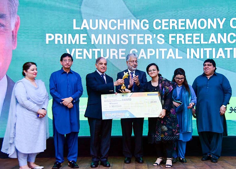 Prime Minister Muhammad Shehbaz Sharif presenting cash prize of Rs.1 million each to recipients of 'National Innovation Awards' during Launching Ceremony of PM's Freelancers & Venture Capital Initiative