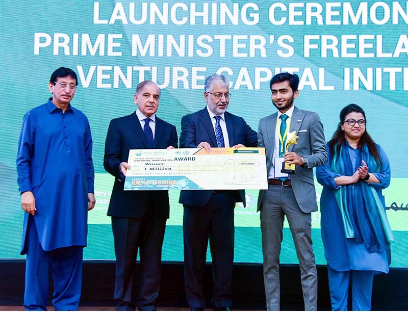 Prime Minister Muhammad Shehbaz Sharif presenting cash prize of Rs.1 million each to recipients of 'National Innovation Awards' during Launching Ceremony of PM's Freelancers & Venture Capital Initiative