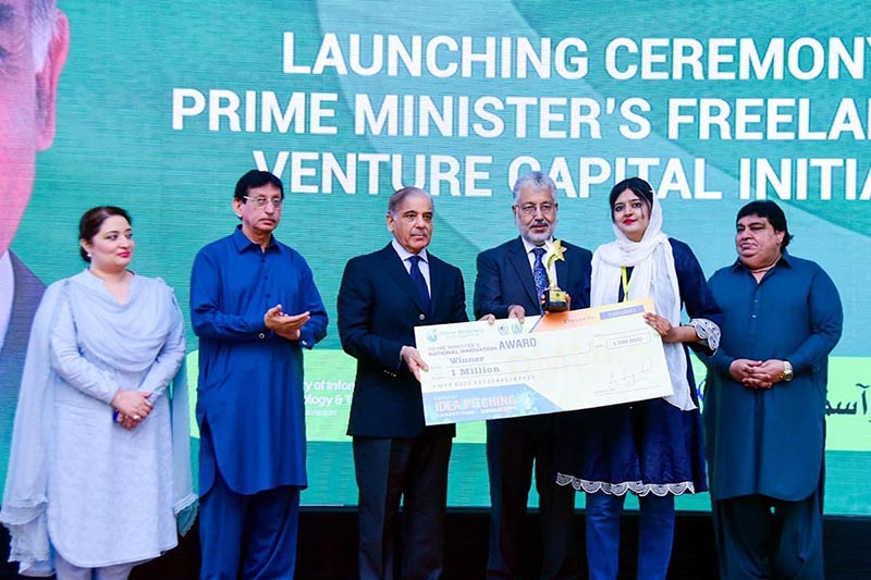 Prime Minister Muhammad Shehbaz Sharif presenting cash prize of Rs.1 million each to recipients of 'National Innovation Awards' during Launching Ceremony of PM's Freelancers & Venture Capital Initiative