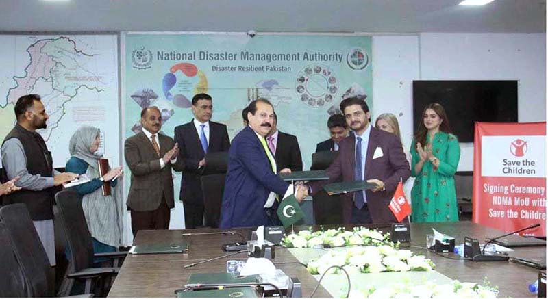 NDMA and Save the Children signs an MoU to enhance cooperation in Fields of Disaster Risk Reduction. Chairman NDMA Lt. General Inam Haider Malik witnesses the ceremony