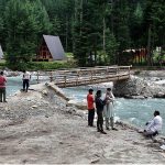 Visitors capture the moment through their cell phone during visit the scenic Kumrat valley