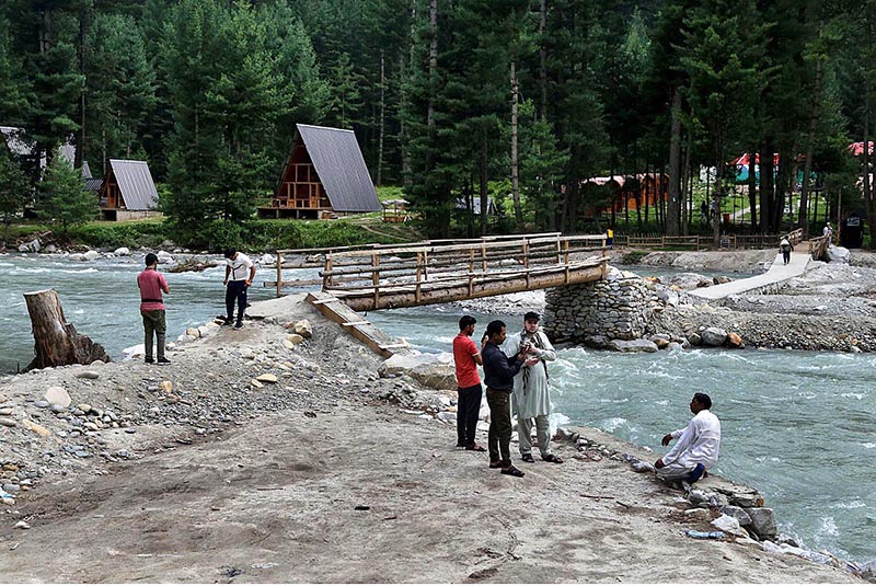Visitors capture the moment through their cell phone during visit the scenic Kumrat valley
