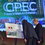 Prime Minister Muhammad Shehbaz Sharif and Chinese President Special Representative and Vice Premier of China Mr. He Lifeng signing the First Day Cover of a commemorative postal stamp at ceremony to celebrate the 10th anniversary of CPEC