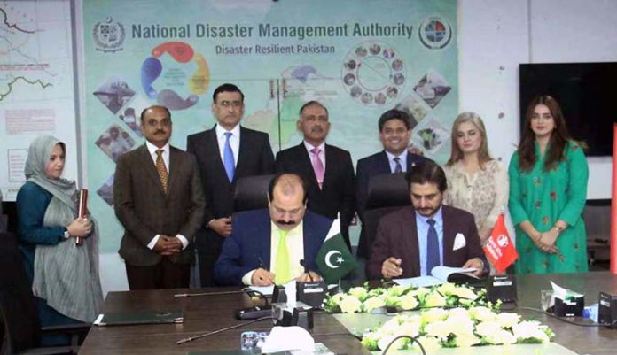 NDMA and Save the Children signs an MoU to enhance cooperation in Fields of Disaster Risk Reduction. Chairman NDMA Lt. General Inam Haider Malik witnesses the ceremony
