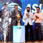 Chairman of the Pakistan Cricket Board Zaka Ashraf with Pakistan's cricketer Wahab Riaz and cricket coach Waqar Younis unveil the Asia Cup 2023 trophy during a ceremony