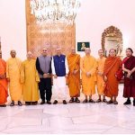 President Dr. Arif Alvi in a group photo with a delegation of venerated monks, who are attending the International Gandhara Symposium 2023
