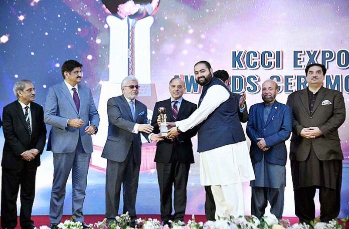 Prime Minister Muhammad Shehbaz Sharif presenting awards to highest exporters at 