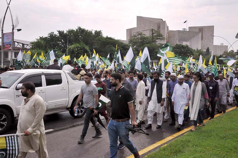 A large number of people participates in rally under the leadership of Advisor to the Prime Minister on Kashmir Affairs and Gilgit Baltistan Qamar Zaman Kaira from Radio Pakistan Chowk to Parliament House to mark the Youm-e-Istehsal (Exploitation Day), Jammu Kashmir falling on 5th August. The day marks the completion of four years since India's illegal action of revoking the special status of Indian Illegally Occupied Jammu Kashmir (IIOJK)