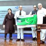 Prime Minister Muhammad Shehbaz Sharif distributing health insurance cards among the working journalists, media workers, artists and technical resource workers