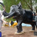 HMC workers busy in cleaning the replica of elephant at local park