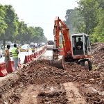 Heavy machinery being used for expansion work of Club Road during development work in Federal Capital