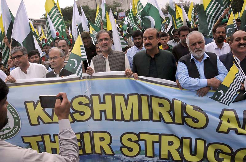 A large number of people participates in rally under the leadership of Advisor to the Prime Minister on Kashmir Affairs and Gilgit Baltistan Qamar Zaman Kaira from Radio Pakistan Chowk to Parliament House to mark the Youm-e-Istehsal (Exploitation Day), Jammu Kashmir falling on 5th August. The day marks the completion of four years since India's illegal action of revoking the special status of Indian Illegally Occupied Jammu Kashmir (IIOJK)