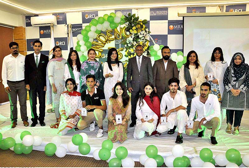 Ambassador of Ethiopia H.E. Jemal Beker Abdula along with Principal, Ms. Sobia Abid in a group photograph with students in connection with 77th Independence Day celebration at Roots International Schools & Colleges, H-8