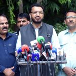 Caretaker Federal Minister for Human Rights Khalil George addressing a press conference at Jinnah House