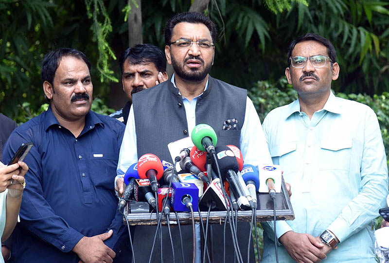 Caretaker Federal Minister for Human Rights Khalil George addressing a press conference at Jinnah House
