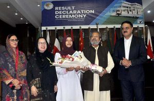 Caretaker Federal Minister for Education & Professional Training Madad Ali Sindhi press the button to announce result during Federal Board of Intermediate and Secondary Education (FBISE) Result Declaration ceremony of HSSC Part I & II, 1st Annual Exam 2023