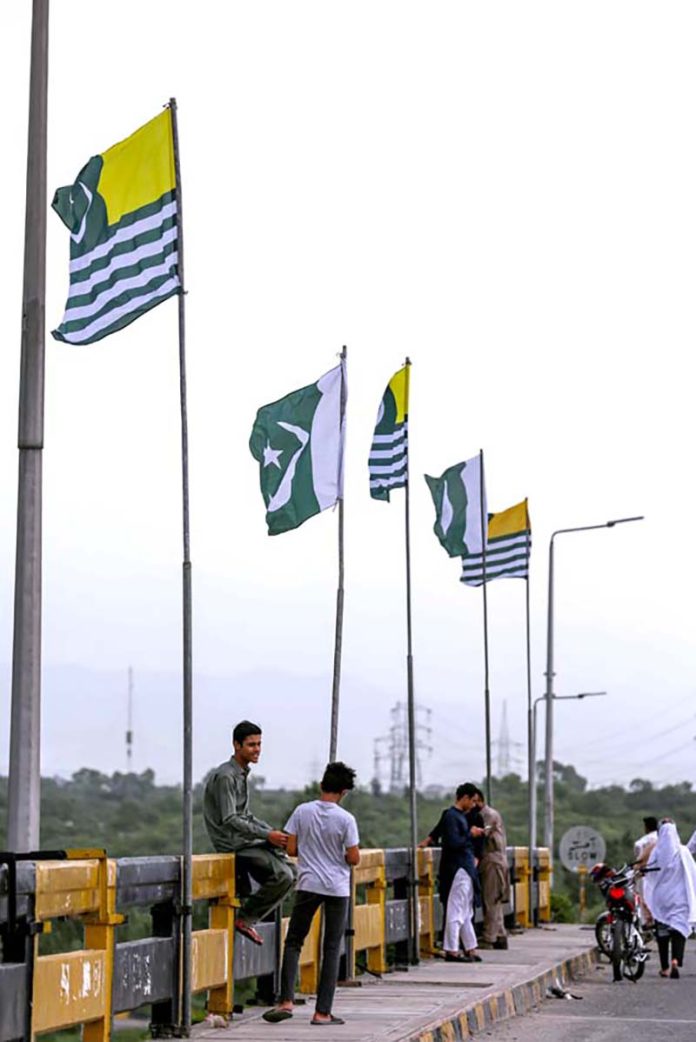 Flags displayed on bridges, urge people to mark the Youm-e-Istehsal (Exploitation Day), Jammu Kashmir falling on 5th August. The day marks the completion of four years since India's illegal action of revoking the special status of Indian Illegally Occupied Jammu Kashmir (IIOJK).