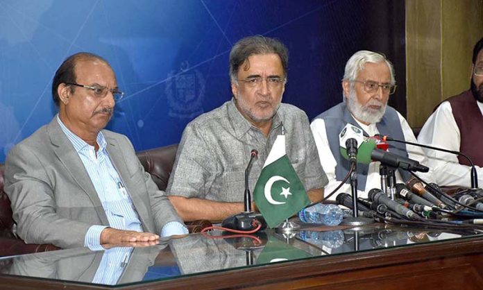 Incumbent Advisor to Prime Minister on Kashmir Affairs, Qamar Zaman Kaira addresses press conference.